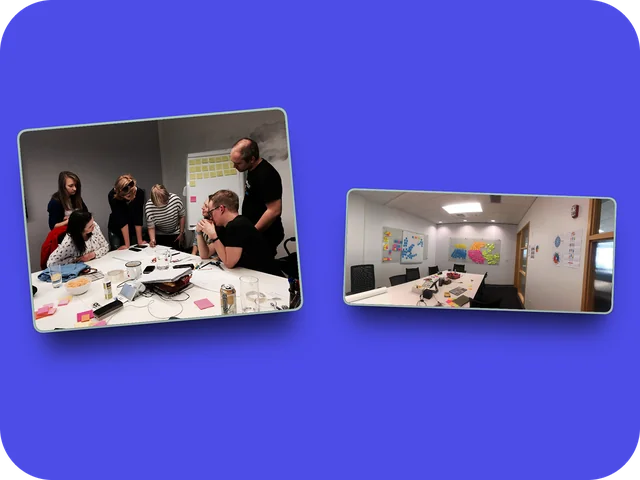 Team collaborating around a table and a sticky-note whiteboard